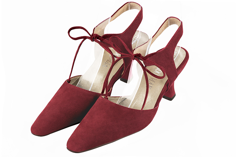 Burgundy red women's open back shoes, with an instep strap. Tapered toe. Medium spool heels. Front view - Florence KOOIJMAN